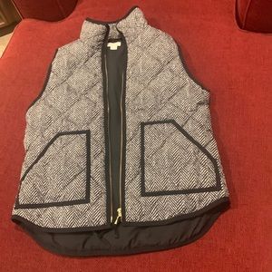 Beautiful gently used snuggly vest to keep you warm!